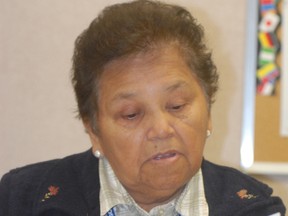 Charlotte Contin, a member of Henvey Inlet First Nation, reviews records for St. Joseph Residential School in Spanish, at the second annual Shingwauk Gathering and Conference: Healing and Reconciliation Through Education at Algoma University on Saturday. Contin looked for information about her friend, Christine Roy of West Bay First Nation, who died in the residential school's infirmary.