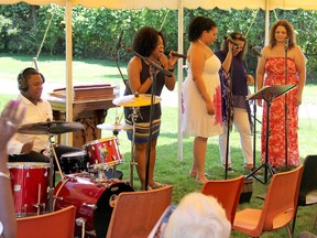 Performers from the Lamb of God Miracle Ministry in Toronto provided musical entertainment during the annual Emancipation Day celebration at Uncle Tom's Cabin Historic Site on Saturday, Aug. 3, 2013 in Dresden, Ont. Pictured from left, are: Odel Johnson on drums, and singers Sonia Collymore, Olga Roberts, Stacey Tabb and Jennifer Harvey. ELLWOOD SHREVE/ THE CHATHAM DAILY NEWS/ QMI AGENCY