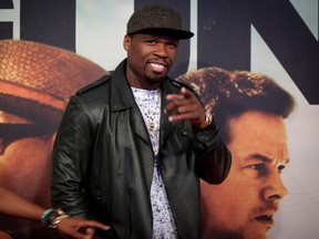 Rapper Curtis "50 Cent" Jackson arrives for the premiere of the movie '2 Guns' in New York, July 29, 2013.  REUTERS/Carlo Allegri