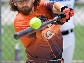 Jeff Weitz of the Alberta Oilmen bats during the 2012 Canadian Slo-pitch championships. File photo/QMI Agency