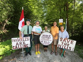 Residents who are trying to have a pair of roads in Georgian Bluffs reopened, recently gathered on one of the hills, known locally as Suicide Hill.