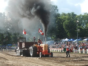 To the delight of the crowds, thick black smoke filled the air during the Embro Truck and Tractor Pull Saturday, August 3, 2013. TARA BOWIE / SENTINEL-REVIEW / QMI AGENCY