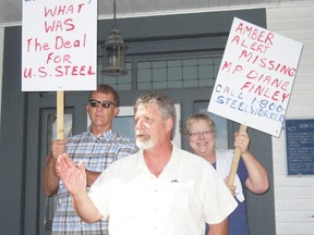 Bill Ferguson of Jarvis, president of Local 8782 of the United Steelworkers in Nanticoke, addresses a protest rally outside the Simcoe office of local MP Diane Finley on Friday. (MONTE SONNENBERG Simcoe Reformer)