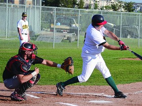 Sherwood Park Athletics standout Ryan Demchuk connects with a pitch during the recent 2013 NCABL all-star game at Centennial Park. The A’s have advanced to the first round of the playoffs this weekend in Westlock. Photo by Steven Wagers/Sherwood Park News/QMI Agency