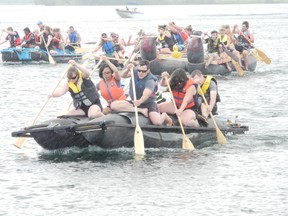 The winning Morrisburg Tubie Festival team maintains their lead during the final in the St. Lawrence River, Sunday, Aug. 4, 2013 in Morrisburg, Ont.
GREG PEERENBOOM//QMI AGENCY