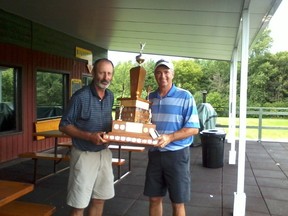Submitted photo
Club captain Lew Stanley (left) presents the trophy to Summerheights Golf Links men's side club champion Mitch Martell, who won the crown with a two-day 159.