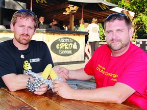 Jaco Bolle (left), marketing co-ordinator of Esprit Rafting, and Jean-Francois Dubois, director of the Chutes Coulonge Park, were on hand Monday night to kick off the corn roast and Ambush concert at Esprit Rafting as park of the Pull Together fundraiser.