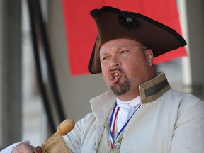 Richard Riddell of Anacortes, Wash., competes in the humour portion of the World Invitational Town Crier Competition in Market Square Monday. (Danielle VandenBrink The Whig-Standard)