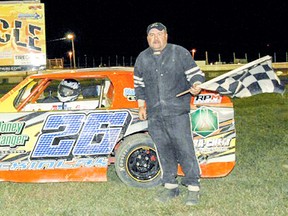 Randy McKinlay of Chatham celebrates his Mini-Mod feature win Saturday at South Buxton Raceway. (JAMES MacDONALD/Special to The Daily News)