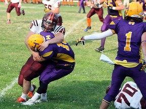 Nipissing Wild linebacker Jordan Beaudoin makes a tackle during a game against the Huronia Stallions. The St. Joseph-Scollard Hall grad is in London as of last week fighting for a spot on the CJFL's London Beefeaters. SUBMITTED PHOTO