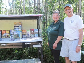Bonnie and Jim Elhorn have been the camp hosts at Saskatoon Island Provincial Park for eight years in a row. The retired couple stays at the campground all summer to welcome guests, assist with park programs and serve as a liaison between staff and campers. The Beaverlodge pair comes back every year for the nature, the familiar faces and to meet new friends. (Elizabeth McSheffrey/Daily Herald-Tribune)