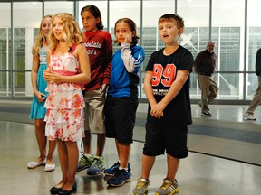 Avery and Alexis Bradfield, Tanner and Luke Bibby and Jax Scott answer questions during a media interview after Tuesday's news conference unveiling the program for the official opening of the Wayne Gretzky Sports Centre. The five will be seen in the coming weeks in various promotional videos and print ads for the event, scheduled for Sept. 29. (HUGO RODRIGUES, The Expositor)