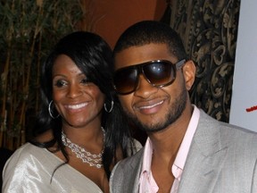 Usher and ex-wife Tameka Foster. (WENN.COM files)