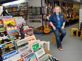 Maggie George, co-owner of RiverSide Music in downtown Trenton is retiring. Maggie and her husband Peter will move back to England. She is seen here in the store last Friday, her second-last official day at the store.

EMILY MOUNTNEY/TRENTONIAN/QMI AGENCY