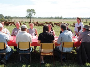 Premier Kathleen Wynne (centre) sits down with a group of men and women from different agricultural groups in the area to talk about the issues that are affecting farmers in Renfrew County and Ontario in this file photo.