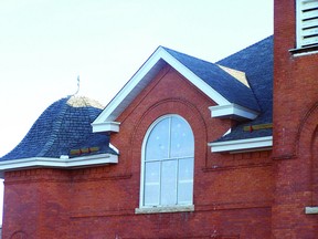 New shingles have been installed that mimic the look of a old fashioned slate roof.
