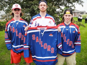 Players Joshua Slegers, Kevin Mummery and Jason Miller showed off the new Port Dover Sailors jersey at the Canada Day parade in Port Dover. (SARAH DOKTOR Simcoe Reformer)