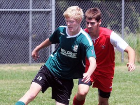 Quinte West Hillcrest Animal Hospital U16 Wolverines' Logan Thurston battles with a Seaway Valley Blazer during East Region Soccer League action Saturday at Centennial Park in Trenton. The Wolverines dropped a 2-1 decision. They'll be back in action this weekend as the Quinte West Soccer Club hosts the 17th Annual Cameron Memorial Tournament at field throughout the city.