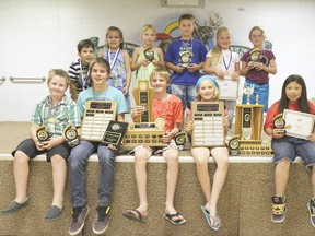 Members of the Wetaskiwin Olympians Swim Club show off their well earned hardware after the club’s award ceremonies July 31 at Moose Lodge.