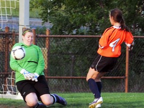 Trenton Sockers A goalkeeper Alyssa Vasko makes an excellent save on a Belleville M & M Meats striker Monday during Bay of Quinte Women's Soccer League First Division action at Zwickís Park. The top-ranked Sockers snapped a three-game losing skid with an 11-1 win.