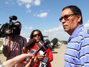 Ermineskin Chief Craig Makinaw addresses members of the media outside of the Ermineskin band office in Hobbema Aug. 6, 2013. Makinaw and the Ermineskin council, as well as seven other band members, 15 elders, Chief Brad Rabbit of Montana First Nation, and the parents of Lance Cutarm, Larry and Lorraine, met with RCMP Superintendant Curtis Zablocki to discuss the Aug. 3 shooting at Ma-Me-O Beach and other concerns about RCMP and First Nations relations.