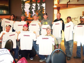 The anglers of Team Canada hold up their jerseys after their names were announced at breakfast on Wednesday, August 7. The Can-Am Challenge pits the best Canadian anglers against the best American anglers for some added fun at the Kenora Bass International.
GRACE PROTOPAPAS/Daily Miner and News