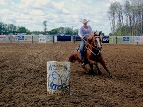 One of the many barrel racing competitors steadies her horse during a run at the Pomeroy Barrel Racing Competition held at Swartzy Performance Horses east of Fairview this past August long weekend. DANIELE ALCINII/FAIRVIEW POST/QMI AGENCY