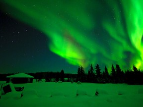 The Aurora Borealis in Wood Buffalo National Park, which is also the world's largest dark sky reserve. COURTESY PARKS CANADA/JOHN D. MCKINNON