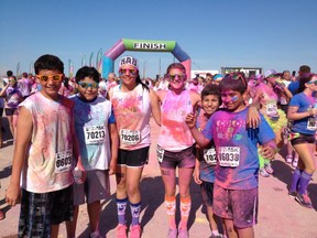 Submitted photos
Top: Anthony Nash, far left, and his brother Eric, far right, with four friends from the Ivan Flett Memorial Dancers at the Colour Me Rad 5K Run on July 18. The group raised $300 to send at risk youth to camp. Bottom: Anthony Nash, centre right, and his brother Eric, far right, with their dance group, the Ivan Flett Memorial Dancers. (Submitted)