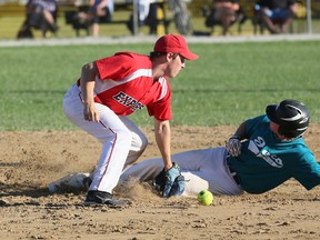 Keady Jets' Michael Loucks slides safely into second on a steal after Napanee Express 2nd baseman Brett Irwin dropped the ball while making the tag during 3rd inning action at the 2013 U21 Men's Canadian Fastpitch Championships at Duncan McLellan Park in Owen Sound on Wednesday; August 7; 2013