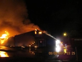 RCMP are investigating after a vacant building that used to house a St. Claude business (restaurant, motel and bar) went up in flames around 3 a.m. Aug. 8, 2013. The structure is a complete write-off. (HANDOUT)