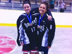 Charleigh Kondas and Chantel Geislinger, both Fort Saskatchewan Rebels, lent their talents to the Beaumont Raiders in the provincial lacrosse tournament. Photo supplied.
