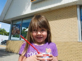 Ellie Moran, 5, of Portage la Prairie bought her favourite Blizzard - Oreo - on Thursday during Miracle Treat Day at Dairy Queen. Every year, Manitoba Dairy Queens raise money for the Children's Hospital Foundation of Manitoba. Money raised will go towards an endoscope, a gastroscope and a colonoscope for the Children's Hospital operating rooms. The Portage la Prairie location has been involved in Miracle Treat Day for 12 years. (Svjetlana Mlinarevic/Portage Daily Graphic/QMI Agency)