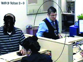 Strathcona County RCMP are looking for a suspected fraudster who hit two banks in Sherwood Park last month. Photo Courtesy of Strathcona County RCMP