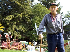 Cliff Bruce, 87, will be selling off his collection of tools and one-of-a-kind lawn ornaments on Saturday at a property auction on Highway 59. CODI WILSON/ Sentinel-Review