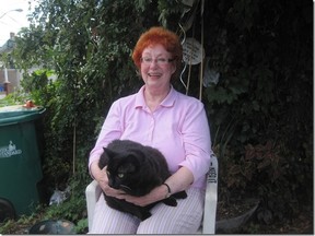 Patsy Davidson and Bagheera: he got a whiff of the Fancy Feast opening and moved in