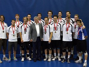 Sherwood Park volleyball standouts Keaton Reid (No. 16) and George Hobern (No. 12, behind the right of Reid) pose with the rest of Team Alberta and Prime Minister Stephen Harper after taking gold in the recent National Team Challenge Cup in Gatineau, Que. Photo supplied