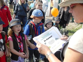 The annual Farm and Heritage Carnival at the Grain Elevator site on Aug. 17 will put the focus on the past and on fun for people of all ages, like these youngsters, who took part in some of the activities last year. - Photo Supplied