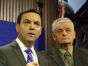 Ontario PC Leader Tim Hudak is seen here with Haldimand-Norfolk MPP Toby Barrett during a press conference in January. Barrett won't be lending his voice to the chorus calling for a review of Tim Hudak's leadership. (Antonella Artuso QMI Agency)
