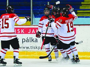 Kingston Frontenacs forward Spencer Watson celebrates with Team Canada teammates following a goal during action at the Memorial of Ivan Hlinka under-18 men’s hockey tournament in the Czech Republic and Slovakia. (Courtesy of Hockey Canada)
