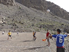 When the Perras family from Paris, Ontario spent a week in Morocco with a family high in the Atlas Mountains, a number of soccer balls and jerseys donated by local organizations were distributed along with supplies they brought along.  Boys from the village of Armed must trek 45 minutes uphill to this plateau where they play soccer on a a gravel pitch.
SUBMITTED PHOTO