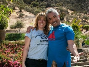 Portage la Prairie resident Debbi McArthur with Cesar Millan at his Dog Psychology Center in Santa Clarita, Calif. Along with her German Shepherd, Cash, they walked with Cesar’s pack and toured his facility. (NEAL TYLER PHOTOGRAPHY/Submitted Photo)