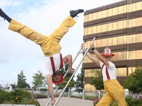 The Circus Firemen perform for reporters Friday morning