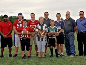 Sherron Birkett (Front Centre), Vice Chair of Food For Thought got to meet Brantford Bison JV athletes Brydan McMahon, Bradley Ward and Peewee athlete Ethan Jamieson, along with their Coach, Jykine Bradley and President, Brad Ward, Brantford Youth Flag Football's athletes Level 3's, Josh Davis and Level 2's Braeden Virtue and their coaches Jay Virtue (inside center, Dan Davis and Nathan Lancaster BYFF's Vice President. The Bison JV's will square up against BYFF's Level 3 and Bison's Peewee with BYFF Level 2 to raise awareness and funds for Food for Thought at the Bisons Alumni Field at WGSC on August 17. (Kara Wilson of Wilson Sports Photography)