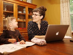 JOHN LAPPA The Sudbury Star
Tara Levesque, of Copperworks Consulting, works from home as her daughter, Luella Donato, colours. Levesque sometimes finds it distracting working in the home environment, but enjoys the flexibility.