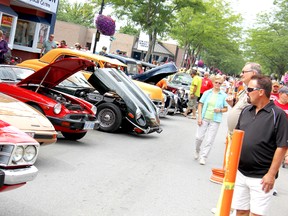 Classic and vintage cars lined the streets of Wallaceburg, attracting thousands of people from all over southwestern Ontario for the 25th annual Wallaceburg Antique Motor Boat Outing (WAMBO) on Saturday August 10.  KIRK DICKINSON/FOR CHATHAM DAILY NEWS/ QMI AGENCY