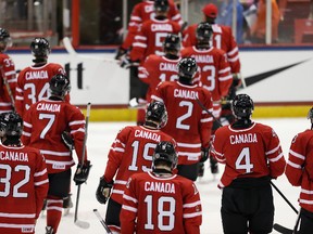 Team Canada leaves the ice following a 5-3 victory over Team Finland during the 2013 USA Hockey Junior Evaluation Camp at the Lake Placid Olympic Center on August 7, 2013 in Lake Placid, New York. (Bruce Bennett/Getty Images/AFP)