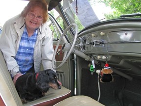 Jean Blondeel and her husband Andre displayed their pristine 1958 VW Beetle at Satuday's Old Auto's car show in Bothwell. The Chatham couple's Beetle has only 32,000 original miles on its odometer. Not surprisingly, the Blondeels' long-haired Dachshund, Lizzie, enjoys going along for a ride when the opportunity arises.