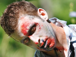 The first Quinte Zombie Zone fundraiser race through the trails of Batawa Ski Hill saw runners making it through mud, zombies, obstacles, mud, zombies and more mud Saturday, Aug. 10, 2013. - FILE PHOTO BY JEROME LESSARD/THE INTELLIGENCER