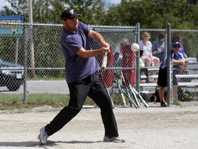 The Kirkland Lake men's slo-pitch league held its tournament this past weekend. A-1 Taxi's John Dybczak makes good contact on the ball during Saturday afternoon action.